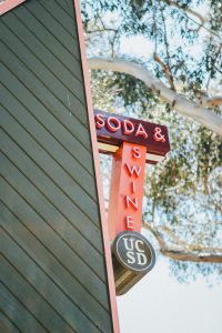custom projecting storefront sign